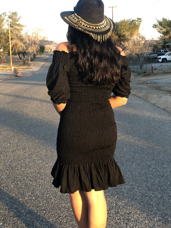 Frilled dress top with embroidery