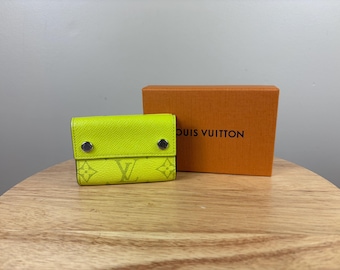 Authentic Louis Vuitton Taigalama Discovery Compact Wallet Neon Yellow w/ Box