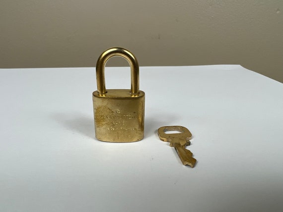 Guaranteed Authentic - Vintage Louis Vuitton Lock & Key Circa. 1980's