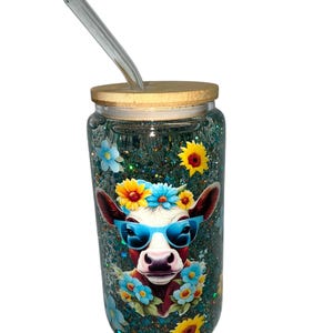 Cow and Flowers 12 oz. glass snowglobe tumbler.