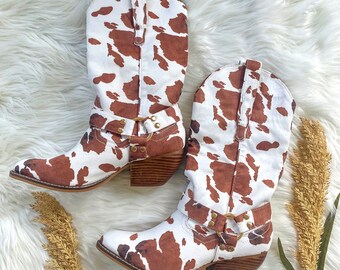 knee high cow print boots