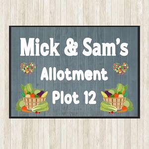 May include: A rectangular sign with a blue wood-grain effect displays the text "Mick & Sam's Allotment Plot 12" in white. Two baskets of vegetables and two heart-shaped designs with colourful dots are also present.
