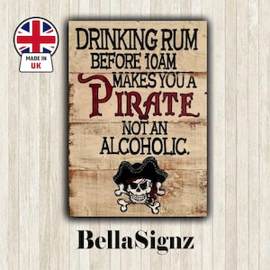 Metal Vintage Drinking Rum Makes You A Pirate Not Alcoholic Quote wall plaque