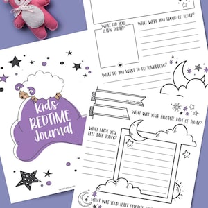 May include: A Kids Bedtime Journal with a purple cloud design and the text "Kids Bedtime Journal". The journal includes prompts for daily reflection, with star and moon illustrations. Soft toys, including a cloud and a bear, are in the background.