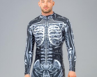 May include: A black and white full-body jumpsuit with a skeleton design. The jumpsuit has a zipper up the front and long sleeves.