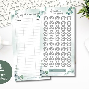 May include: Printable savings tracker with a green watercolor background and a sheet of paw print stickers. The tracker has columns for date, plus or minus, and total. The paw print stickers are black and white and have a green watercolor background.