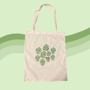 Superhero dinosaur tote bag