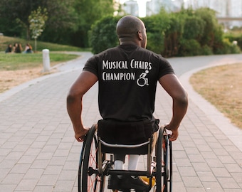 Musical Chairs Champion Unisex t-shirt, Wheelchair Humor, Disability Shirt, Funny, Mobility Aid, Powerchair