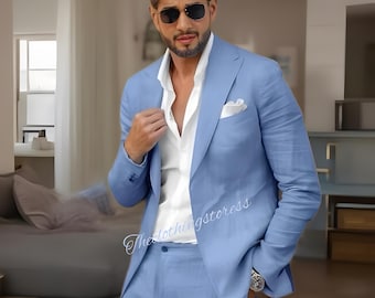 May include: A light blue suit with a matching blazer and trousers. The blazer has a pocket square and is worn over a white button-down shirt. The image also shows sunglasses and a watch.