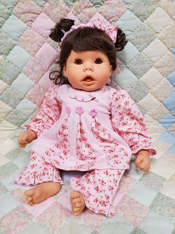 19" Snuggle Kids Doll | Soft Body with Weighted Pellets | 3 Piece Pink Floral Clothing Set