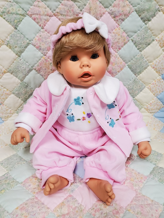 19" Snuggle Kids Doll | Soft Body with Weighted Pellets | 4 Piece Pink Velour Clothing Set