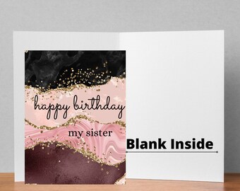May include: A birthday card with a black, pink, and burgundy abstract design. The words "happy birthday my sister" are written in a script font. The inside of the card is blank and reads "Blank Inside".