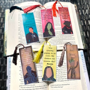 May include: Set of ten colorful bookmarks featuring characters from the Guardians of the Galaxy movie. Each bookmark has a quote from the character depicted. The bookmarks are printed on cardstock and have a tassel.