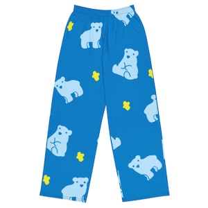May include: Blue pyjama trousers with a pattern of white polar bears and yellow stars.