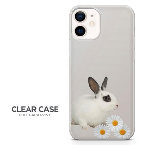 Light Gray TPU phone case with Bunny & Daisies:
Soft gray matte phone case with a black and white bunny and white daisies. Minimalist and gentle spring design. Add your name or favorite quote for a personal touch. Makes a charming gift for any bunny lover.