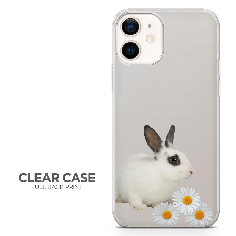 Light Gray TPU phone case with Bunny & Daisies:
Soft gray matte phone case with a black and white bunny and white daisies. Minimalist and gentle spring design. Add your name or favorite quote for a personal touch. Makes a charming gift for any bunny lover.