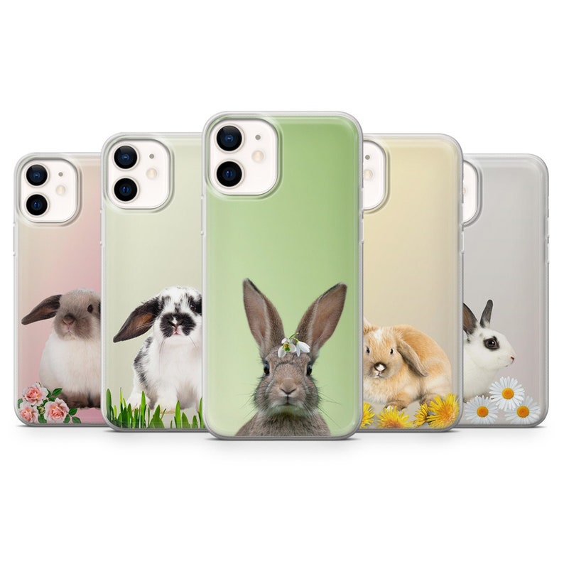 Set of five matte pastel bunny phone cases featuring adorable rabbits with flowers: roses, snowdrops, daisies, and dandelions. Available for iPhone and Samsung. Each case can be personalized with your name or initials. Perfect Easter or spring gift for animal and nature lovers.