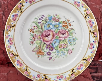 Piatto vintage in porcellana Depos Porzellainfabrik con decorazioni floreali, 26 cm circa, prodotto in Italia, in ottime condizioni.