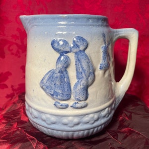 Vintage Brush McCoy Salt Glazed Stoneware Milk Jug Dutch Boy and Girl Kissing