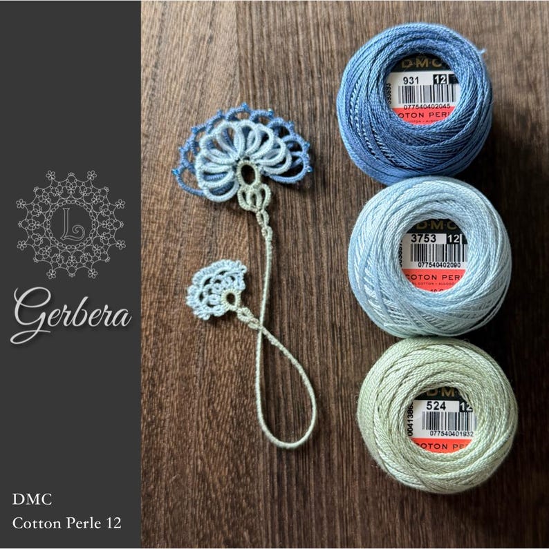 May include: A tatting lace flower motif in light blue and pale green thread, accompanied by three spools of DMC Cotton Perle 12 embroidery thread in shades 931, 3753, and 524. The thread labels clearly display the brand and color numbers.