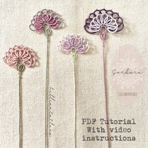 May include: Four tatting lace bookmarks in shades of pink and purple, each featuring a fan-shaped floral motif on a long thread stem. Text on the image reads: Gerbera, Lilliantatlace, and PDF Tutorial With video instructions.