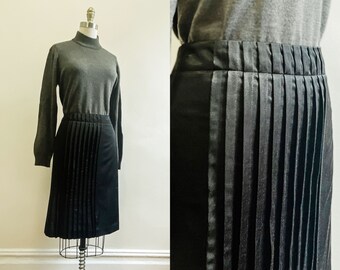 vintage dark academia pleated black satin knee-length skirt by martin + osa