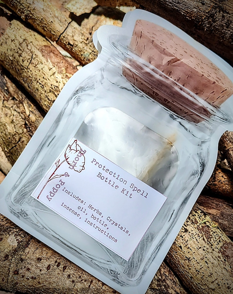 May include: A clear glass bottle with a cork stopper, packaged in a white plastic bag. The bottle is labeled "Protection Spell Bottle Kit" and includes the text "Includes: Herbs, Crystals, oil, bottle, incense, instructions".