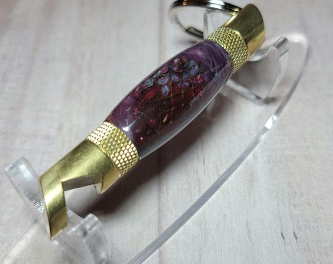 Bottle opener, sweetgum pod. Hand turned keychain bottle opener