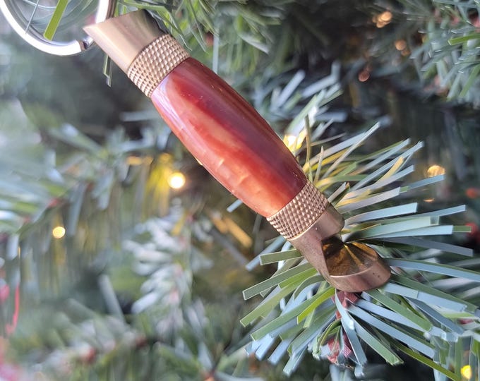 Bottle opener, amber. Hand turned keychain bottle opener