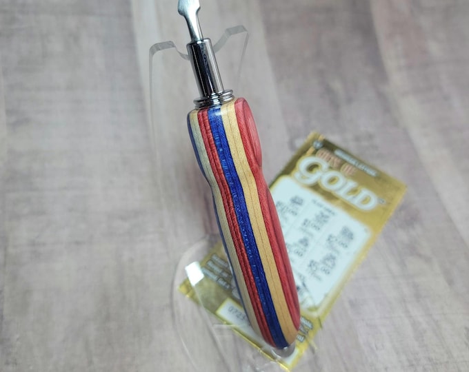 Lotto ticket scratcher scraper; red, white, and blue wood
