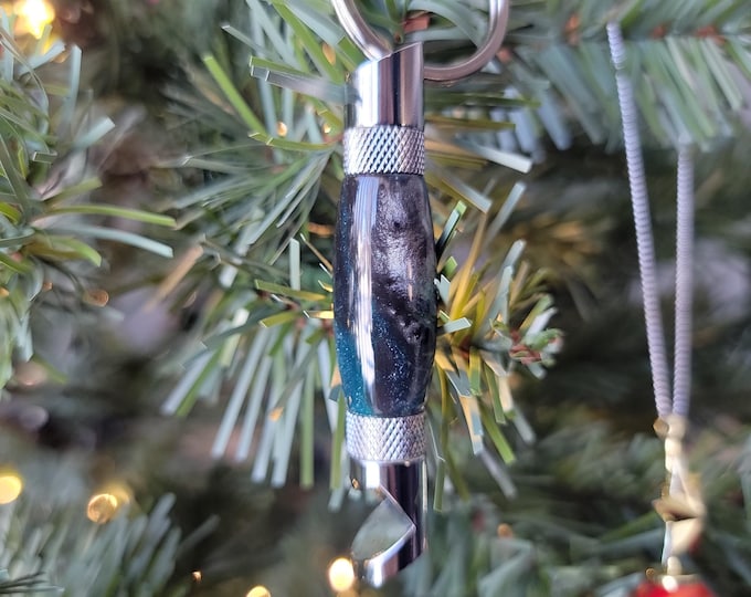 Bottle opener, stormy. Hand turned keychain bottle opener