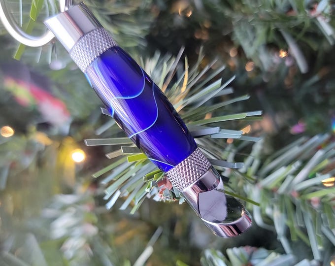 Bottle opener, bright blue. Hand turned keychain bottle opener