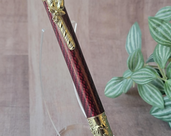 Handmade Christmas pen, Red Carbon Fiber.  Red and Gold hand turned luxury pen Santa, Candy Cane.