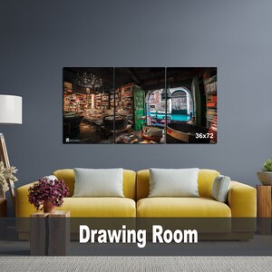 May include: A three-panel canvas print depicting a bookstore interior with bookshelves filled with books. The middle panel shows a view of a canal with a boat and buildings. The print is displayed on a wall in a living room with a yellow sofa and plants.