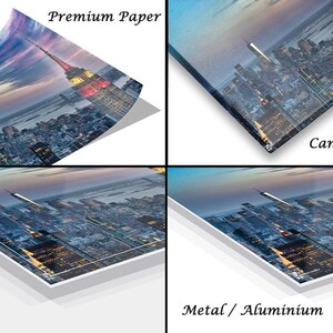 May include: A comparison of different print options for a cityscape photograph. The image shows a panoramic view of a city skyline at sunset, with the Empire State Building visible in the center. The print options include premium paper, canvas wrap, acrylic, and metal/aluminum.