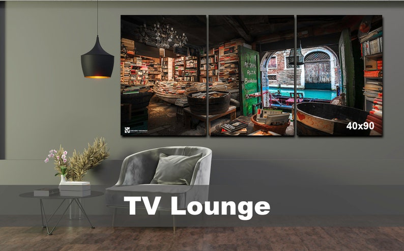 May include: A three-panel canvas print depicting a bookstore interior with shelves full of books, a wooden floor, and a view of a canal in Venice, Italy. The print is 40 inches by 90 inches.