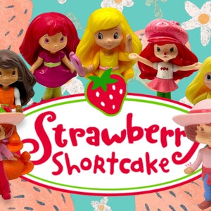 May include: A collection of Strawberry Shortcake dolls, including Strawberry Shortcake, Orange Blossom, Raspberry Tart, Lemon Meringue, and a few others. The dolls are all wearing their signature outfits and have bright, colourful hair.