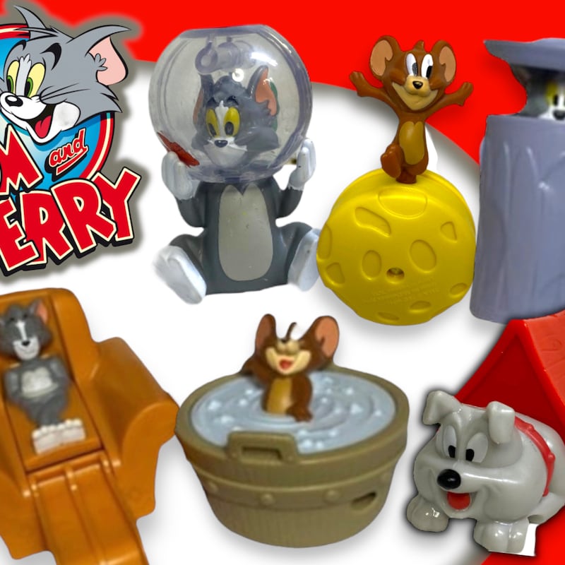 A vintage 1960's Burbank Toys Tom & Jerry musical Jack in the Box with pop-up Tom figure. In working