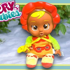 Cry  Babies Tiny Cuddles Happy Flower Ava 9” Baby Doll in Poppy Flower Themed Pajamas Pre Loved