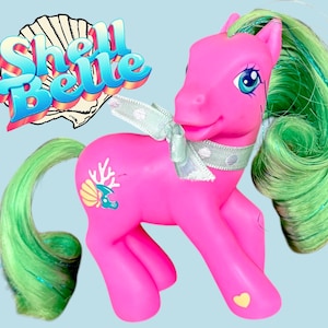G3 Shell Belle My Little Pony 2005 Hasbro Shimmer Pony Series Pink Body with Green Tinsel Hair Pre Loved