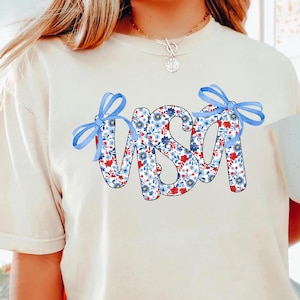 Comfort Colors® Coquette USA Shirt 4th of July Floral Patriotic Tee for Women Red White Blue Aesthetic Bow Shirt Stars and Stripes T-Shirt
