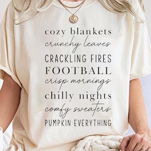 Cozy Blankets Crunchy Leaves Crackling Fires Football Shirt, Fall List Shirt, Womens Halloween Shirt, Thanksgiving Gifts, Autumn Sweater