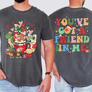 Disney Christmas T-shirt with Toy Story holiday theme, great gift for Toy Story lovers and fans of Woody and Buzz