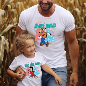 Father and son matching Disney shirts featuring Goofy and Max with "Rad Dad" and "Rad Like Dad" text, perfect for Disney World Father's Day or family vacation outfits.