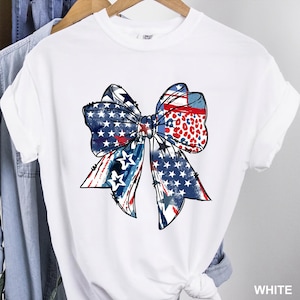 Patriotic bow shirt design with red white and blue colors stars and stripes perfect for 4th of July womens Independence Day summer outfit