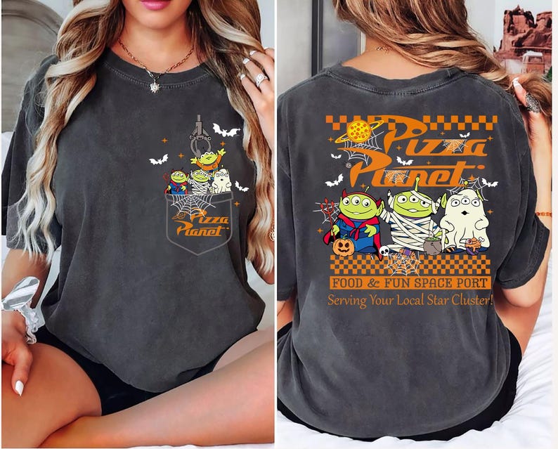 Toy Story Pizza Planet Halloween shirt front design with three green aliens dressed as devil mummy and ghost holding candy, featuring vintage Disney Halloween style for Not So Scary Party or Disneyland trip. Pizza Planet Halloween claw machine pocket design on the back of shirt with Toy Story aliens in costumes and spooky spiderweb, perfect for Disney family matching Halloween outfit and Mickey’s Not So Scary event.