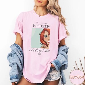 But Daddy I Love Him Comfort Colors Shirt for Disney Family Trip, Little Mermaid Ariel Comfort Colors Shirt, perfect for Magic Kingdom, Disney Princess Ariel Shirt, But Daddy I Love Him Quote Tee, Retro Disney Ariel T-Shirt, But Daddy I Love Him Design, Magic Kingdom Trip Shirt featuring Ariel and “But Daddy I Love Him”, Ariel Inspired Comfort Colors Shirt for Disney Family Vacation