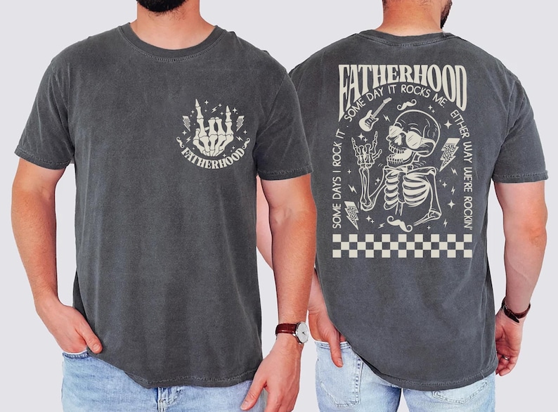 Funny Fatherhood shirt featuring rock and roll skeleton hand with sunglasses and lightning bolts, bold graphic tee for dads who love music, cool retro Father's Day shirt for first-time dad or new dad, punk dad gift t-shirt with skeleton design, Father's Day gift for husband from kids, edgy and fun dad shirt with vintage rock band vibe, fatherhood rocks themed tee for dad’s birthday or family photos