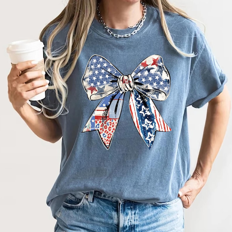 Distressed patriotic bow graphic in red white and blue with stars stripes and mixed animal print patterns perfect for USA 4th of July shirts women’s Independence Day tees America flag summer outfits cute freedom celebration apparel or red white blue patriotic shirt for parades BBQs and holiday events