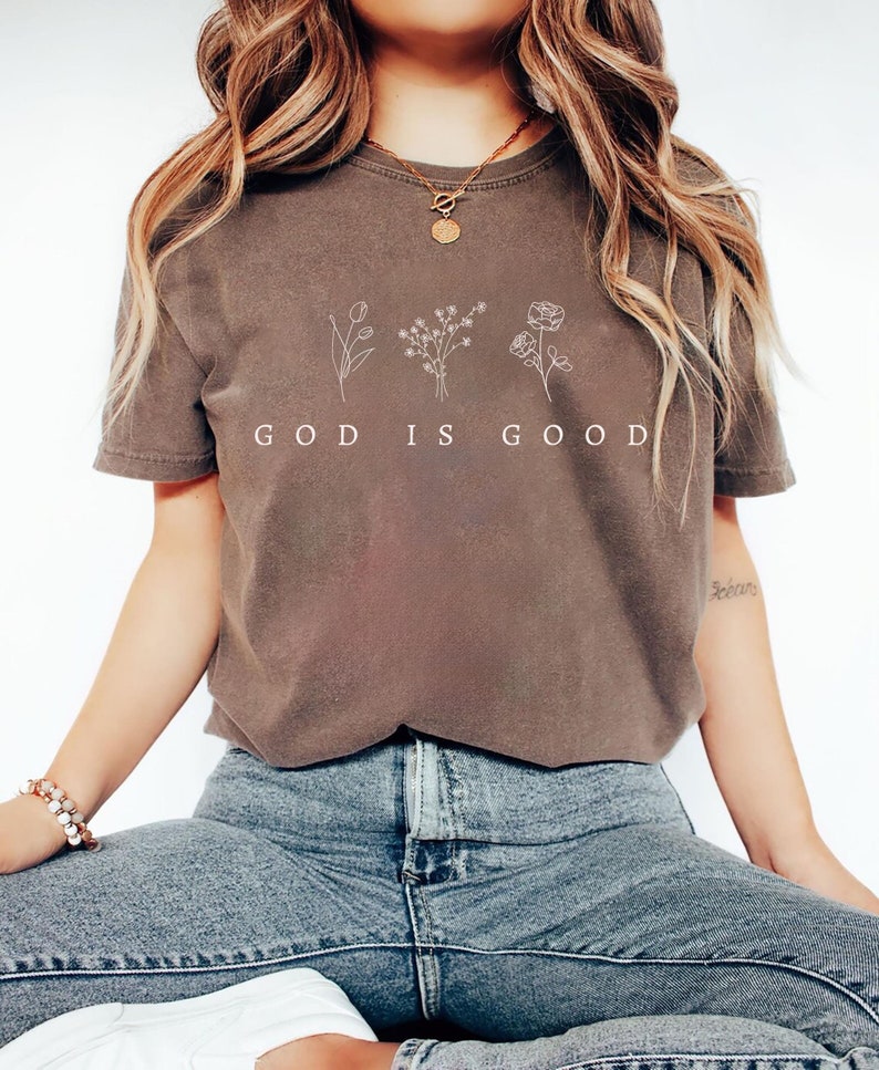 Faith based God is Good sweatshirt, inspirational Christian apparel with minimalist floral design for religious women and men.